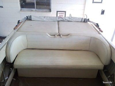 Reupholstered boat interior seating completed by the marine service team