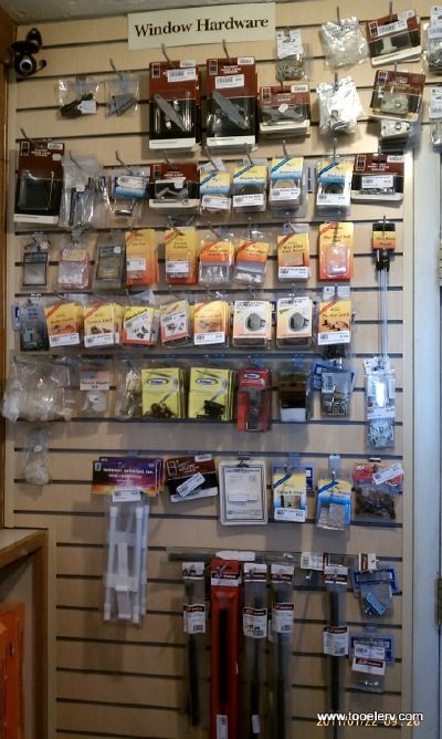 RV window hardware, latches and catches on a slat wall display